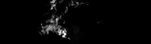 profile of smoker with cloud of smoke